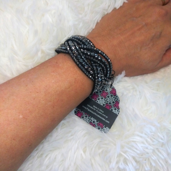 NWT Bring on the Bling blackl and silver. Wrap and Snap bracelet